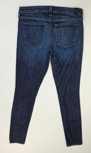 Back view of Vince Dylan skinny women’s 28X31 blue denim jeans with five pockets and belt loops made in the USA.