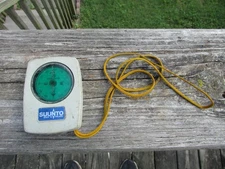 Vintage SUUNTO COMPASS w/sight glass Made In Finland GOOD Condition w/CORD STRAP
