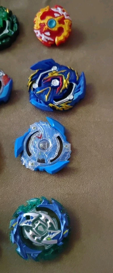 Beyblade Lote Mixto De 20 Fusion Burst Bakuten Shoot TAKARA TOMY Foto 4 de 4