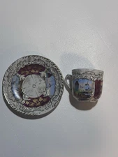 Vintage Porcelain Cup and Saucer Set with Scenic Design