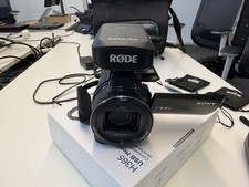 Sony FDR-AX53 4K Handycam, With RODELink radio Mic (+2nd Lapel Mic) And Case.