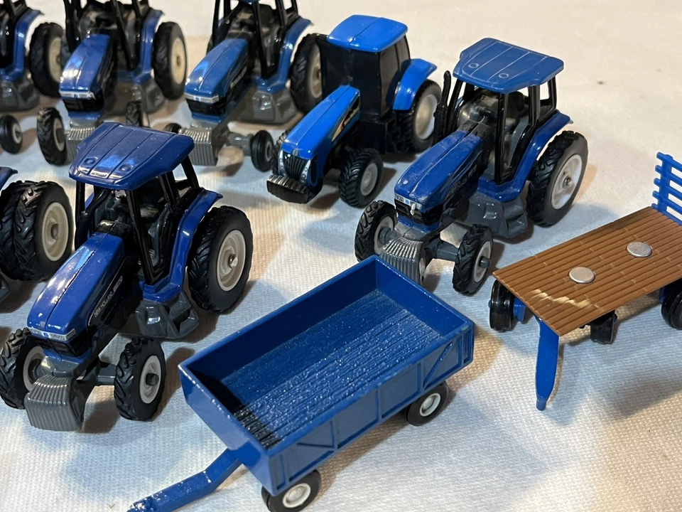 ERTL 1/64 New Holland Lot of 17 Tractors & Implements - Image 3 of 4