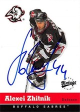 Alexei Zhitnik autographed Hockey Card (Buffalo Sabres, SC) 2000 Upper Deck #45