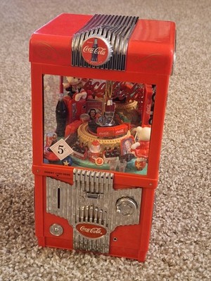 1997 Enesco Coca-Cola Wind-Up Musical Coin Bank Claw/Grabber Machine