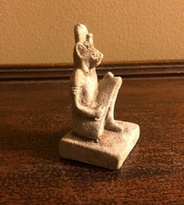 Egyptian Seated Eye Of Ra, Goddess Of War Sekhmet With Sun Disk 