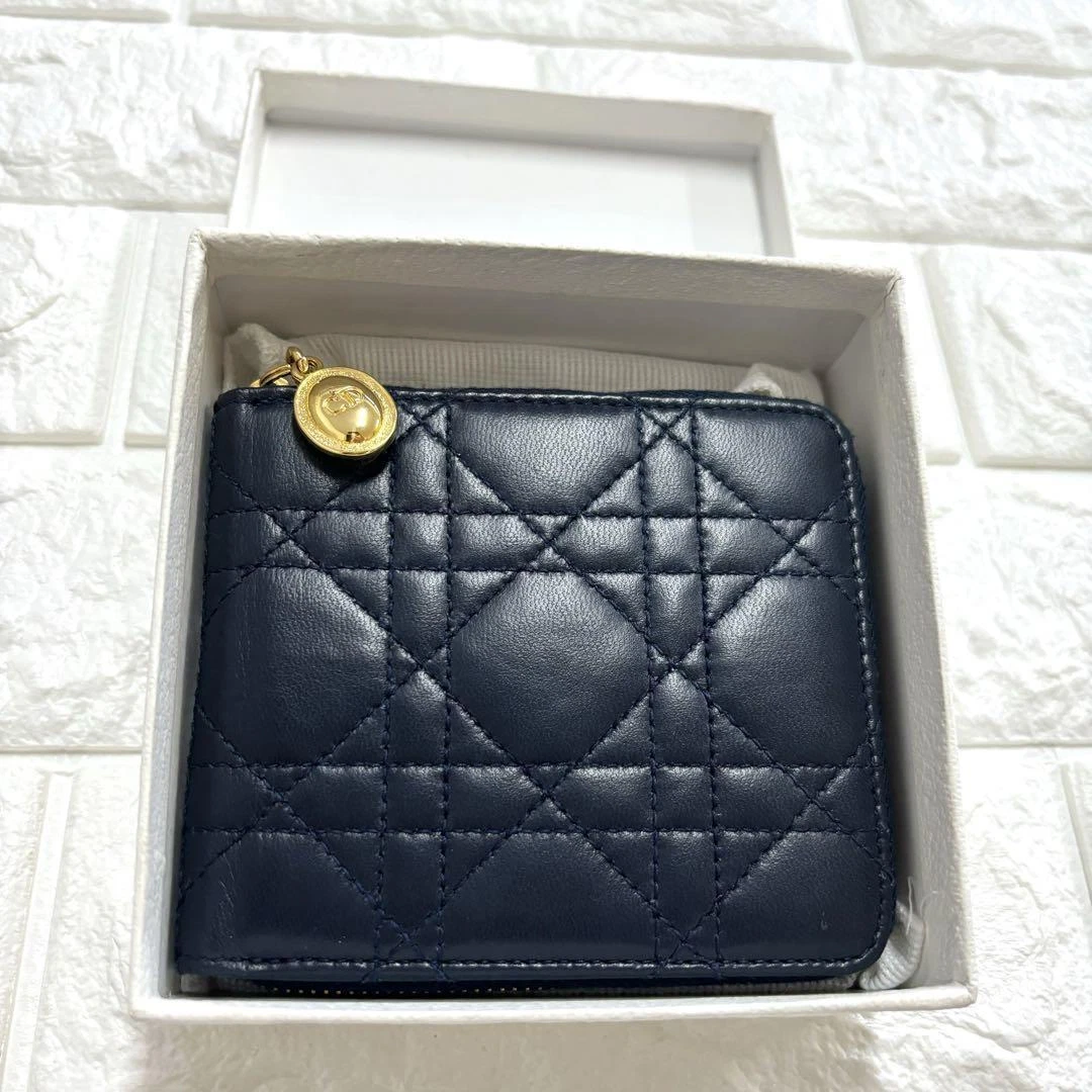 Portefeuille compact Dior Cannage cuir marine occasion femme