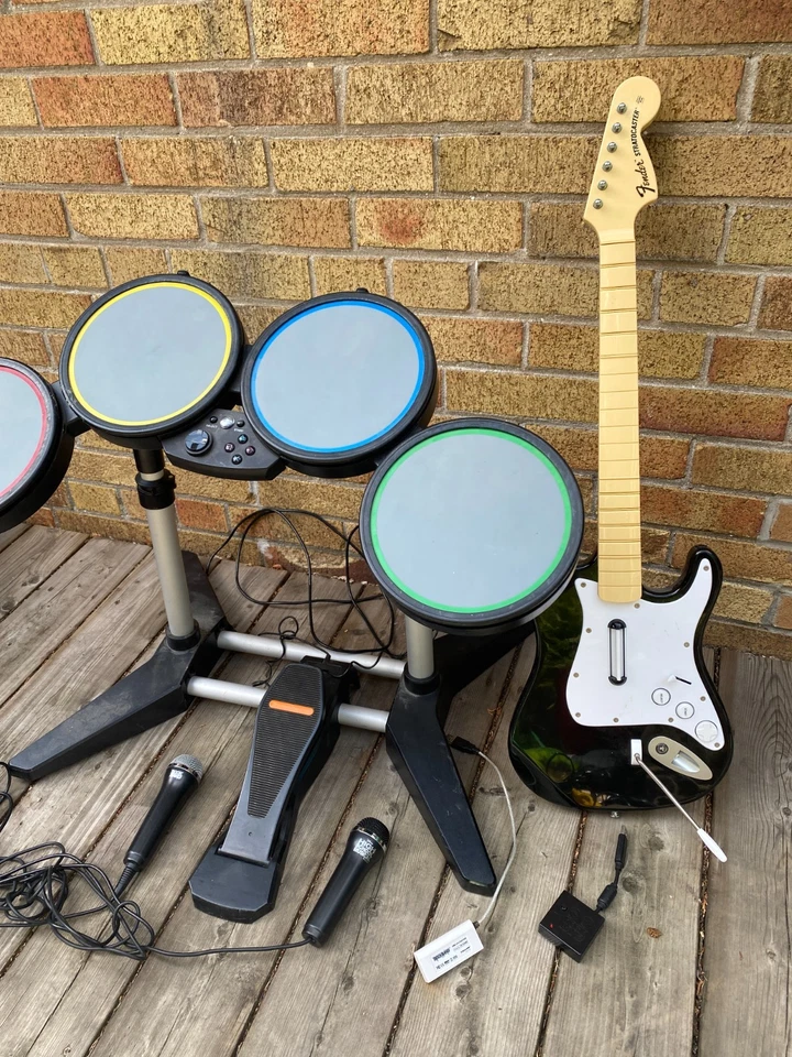Rock Band Bundle PS3 Console, Wired Drums, Fender Stratocaster W/ Dongle, 2X Mic - Image 3 of 4