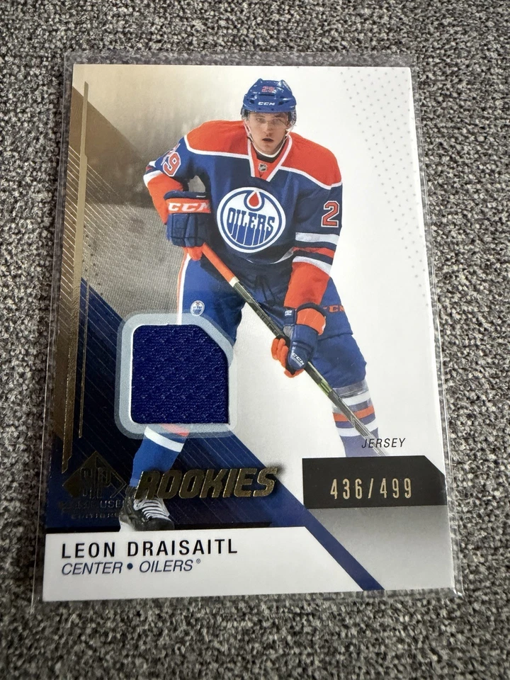 2014-15 Leon Draisaitl SP Game Used Gold Rookie Jerseys #147, 436 /499