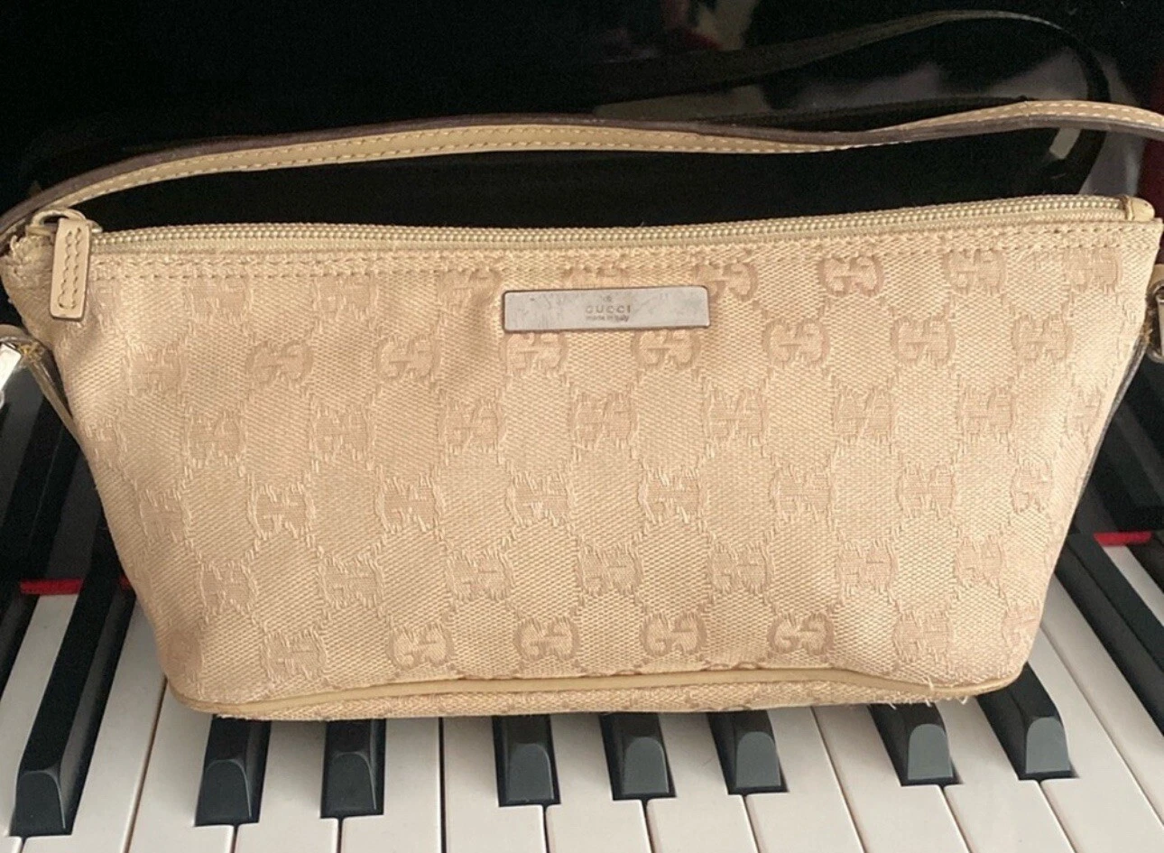 Sac pochette Gucci Supreme en excellent état