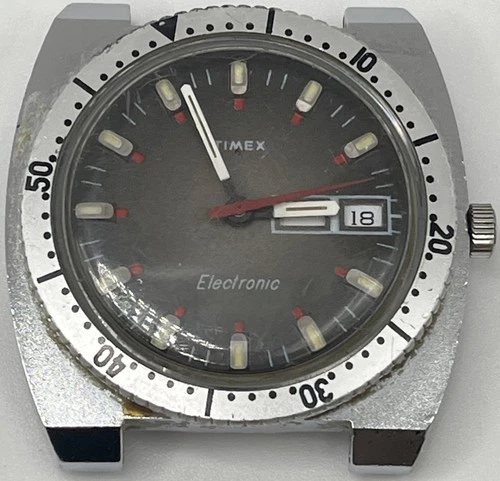 Vintage Mens Silver Tone Timex Electric watch RUNS AND STOPS HB