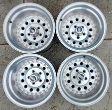 15x10 5x4.5 Supreme American Racing Outlaw Ii Wheels Rims Eagle Alloy Centerline