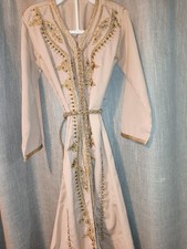 This is an elegant Moroccan kaftan dress with gold-toned embroidery  3 years