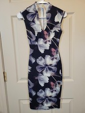GLARE Sleeveless Floral Bodycon Dress