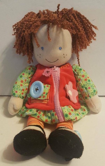 learning doll with zips and buttons