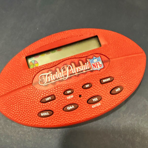 Trivial Pursuit NFL Handheld Electronic Trivia Game - Adult 17+ NFL
