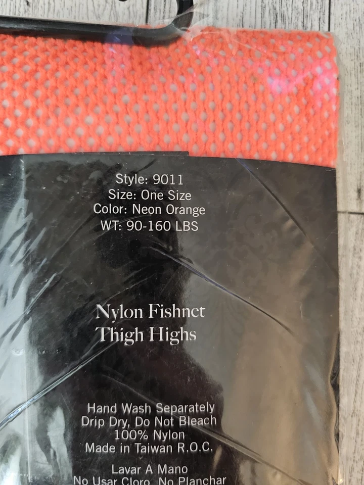 Medias hasta el muslo Leg Avenue Fishnet OSFM 90-160 lb, color, naranja neón Foto 3 de 4