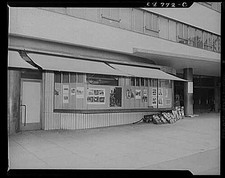 Photo:Storefront Window Display 1950s Awning Sidewalk Shopfront Photos