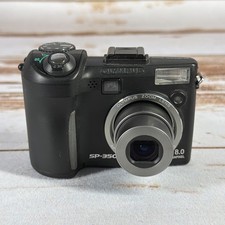 Olympus SP-320 7.1MP Digital Camera Gray Compact 2.5″ Screen 3x Optical Zoom