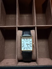 Seiko SWR104P1 Men's Gold Tone Tank Watch White Roman Dial Black Leather Quartz