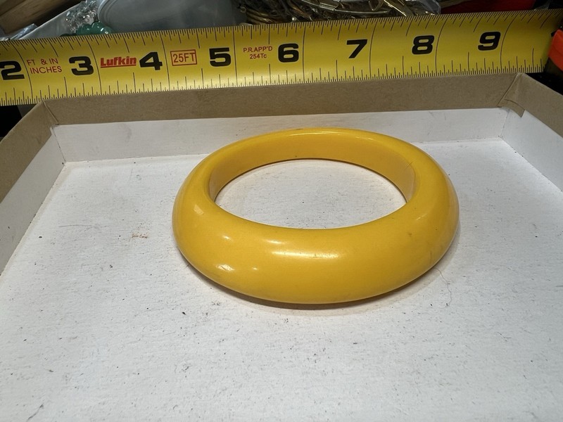 Bakelite bangle bracelet, from 1930s or 1940s, a thick, domed, and opaque design