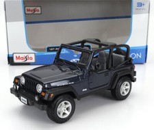 MODELLINO AUTO STATICO DIECAST JEEP WRANGLER RUBICON OPEN 2012 BLU SCALA 1/27