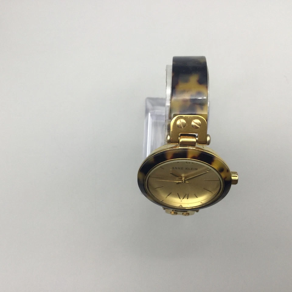 Reloj Anne Klein Mujer 34mm Tono Dorado Imitación Tortuga Banda Batería Nueva 7" Foto 3 de 4