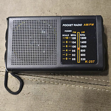 K-257 AM/FM Pocket Radio Black w/ Wrist Strap, Headphone Jack