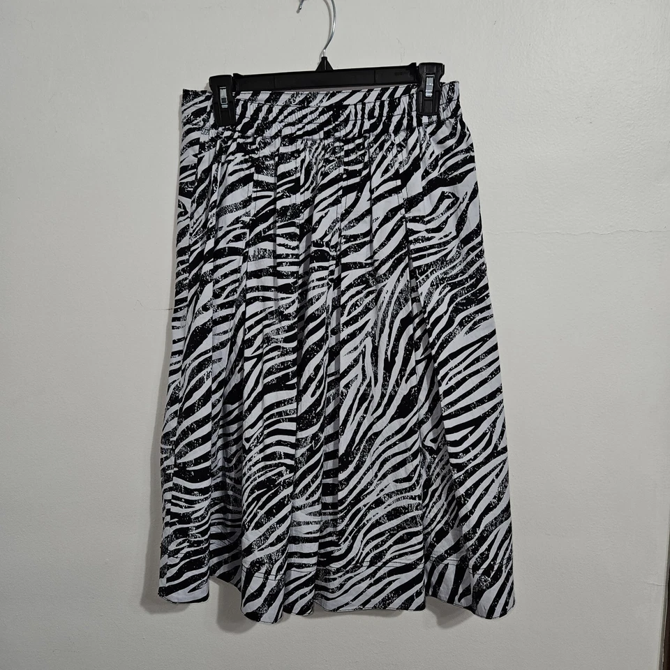 Falda midi plisada con estampado de cebra Donna Karen. Talla XS. Foto 2 de 4
