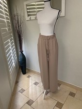 Guess pants pull on wide leg Travel pants size S beige