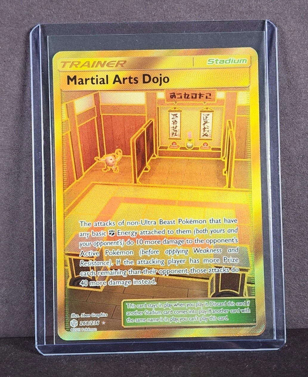 NM - GOLD HOLO Martial Arts Dojo 268/236 SECRET RARE Cosmic Eclipse Pokemon Card