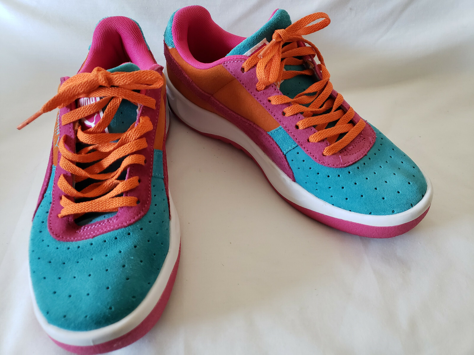 puma suede black and orange