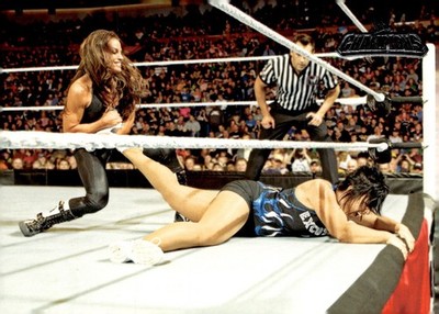 2011 Topps WWE Champions #66 Trish Stratus Fights Vickie Guerrero