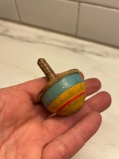 VINTAGE COLORFUL YELLOW RED BLUE TOY SPINNING TOP METAL ANTIQUE SMALL