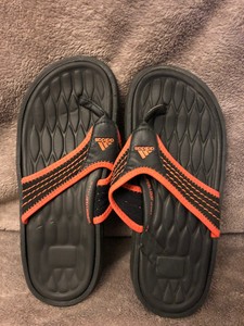 adidas orange flip flops