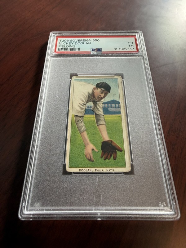 1909-11 T206 Sovereign 350 Mickey Doolan Fielding Rookie Card.  PSA 1.5