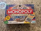 Monopoly: Here & Now the World Edition 2008 Electronic Banking Board Game