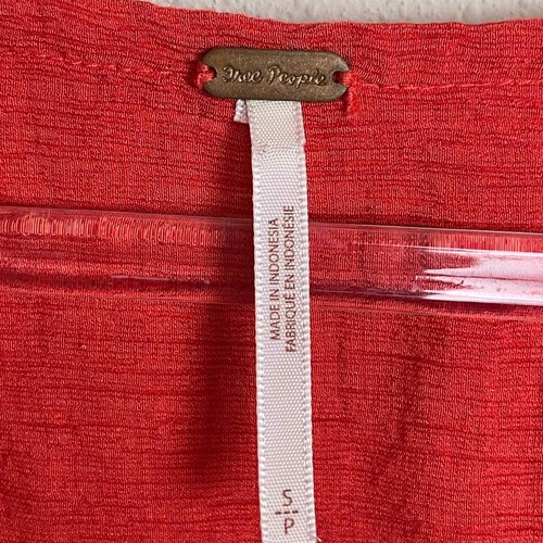 Top Free People Crinkle Surplice Alto Bajo Naranja Manga Larga Talla S - Imagen 3 de 6