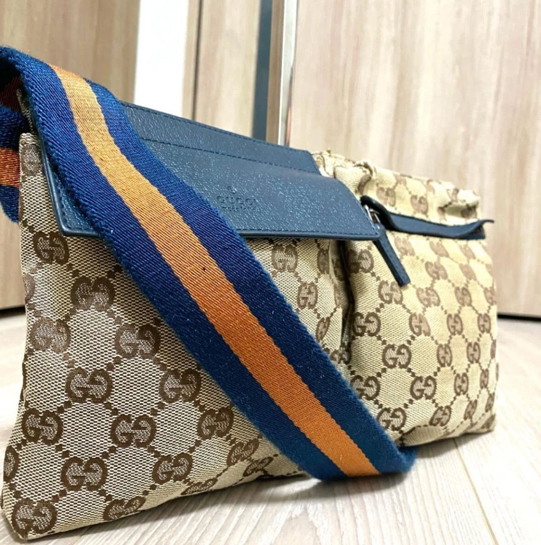 Authentique sac GUCCI GG taille pochette beige marine toile cuir 28566 bon état
