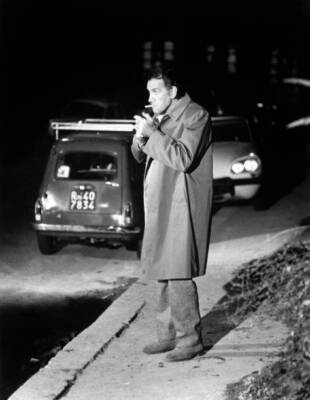 Italian actor Massimo Girotti smoking a cigarette in street Rome - 1970 Photo
