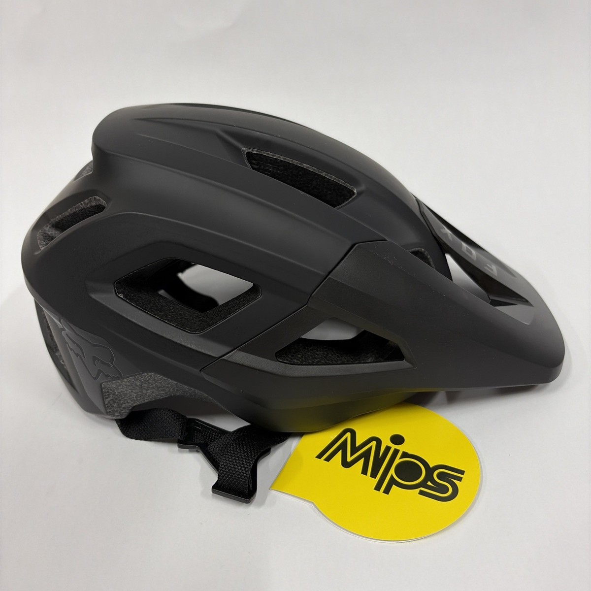 Fox Racing Mainframe MIPS Helmet - Black/gold Large for sale