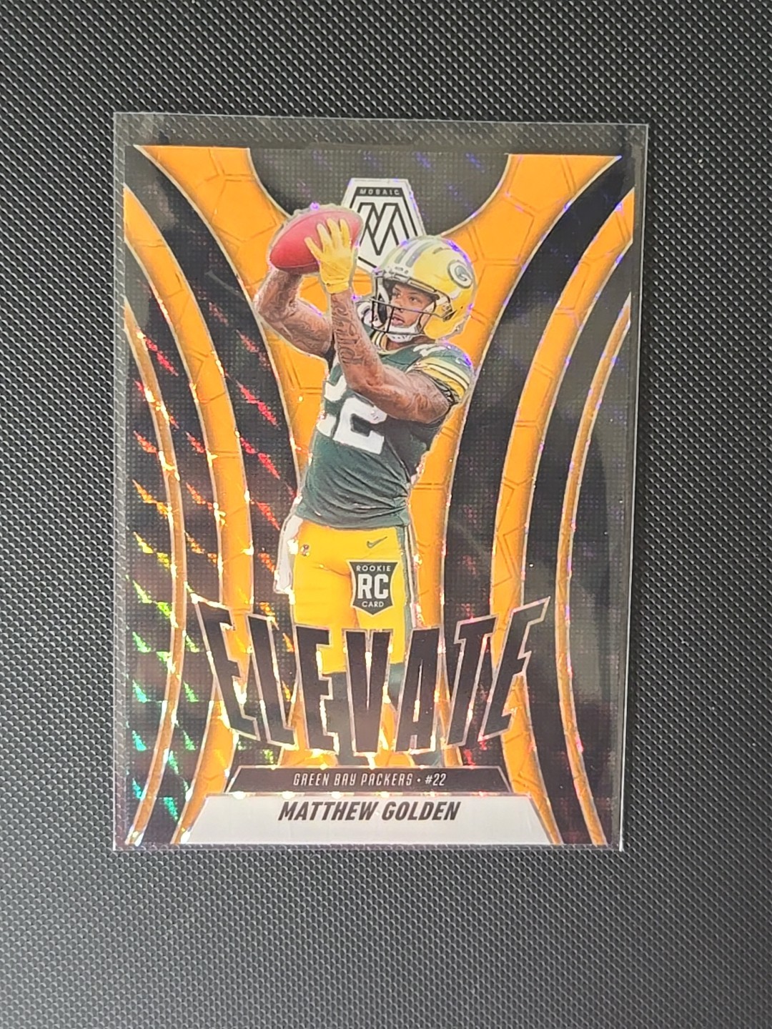 2025 Panini Mosaic - Elevate Matthew Golden Orange Fluorescent Mosaic Prizm (RC)