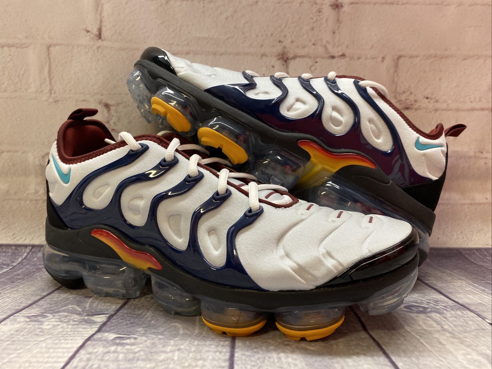 grey blue and orange vapormax
