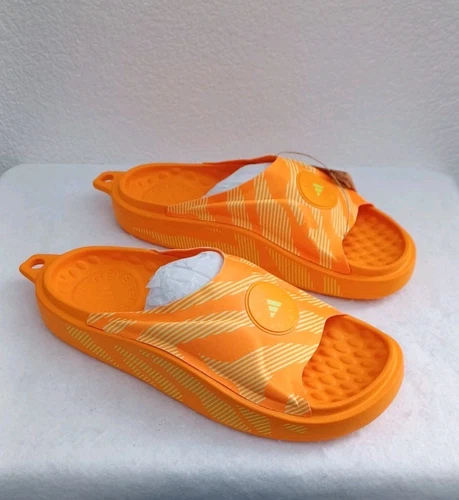 Nuovo scivolo donna Adidas x Stella McCartney ~ arancione ~ prezzo al pubblico consigliato $ 90 (IE3412) taglia 9