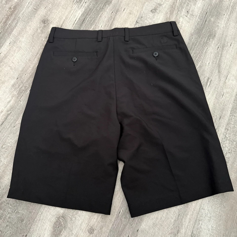 Pantalones Cortos de Golf Footjoy Para Hombres 32 Negros Frente Plano Ligeros Elastizados Rendimiento FJ Foto 3 de 4