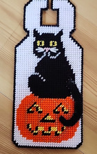 Halloween Black Cat Sitting on Jack O Lantern Plastic Canvas Door Hanger