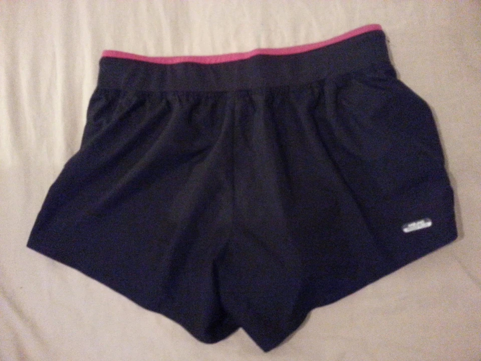 Pantalones cortos deportivos para mujer Mizuno XS negros Foto 2 de 4