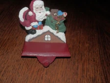 Colorful Christmas Santa Stocking Hanger Cast Iron Base 4.5  x 4.5 x 2.5 in
