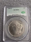 1904O MORGAN SILVER DOLLAR GRADED CAC MS63