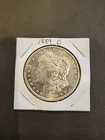 1889-O Morgan Silver Dollar About Uncirculated