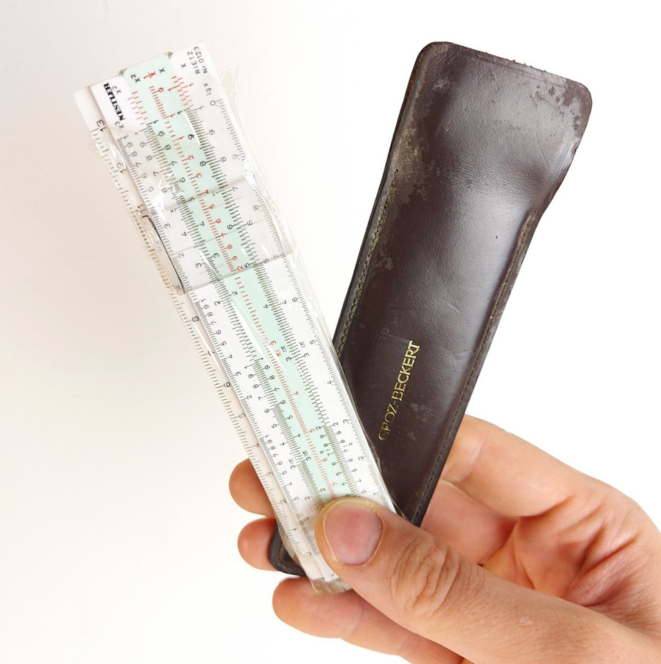 A beautifully crafted West German pocket slide rule from Nestler — the pre-calculator era's precision instrument, now a gorgeous desk artifact and conversation piece.